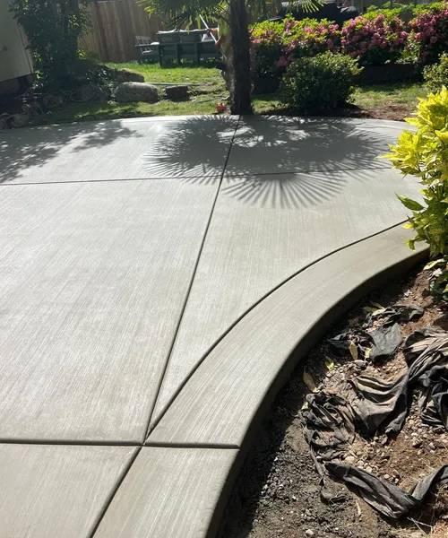Broom finish patio and decorative borders in Covington 